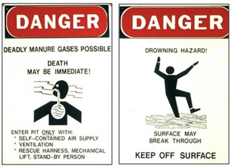A bright red sign saying danger with a graphic of a person slipping