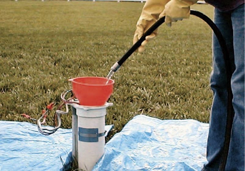 photo of a person putting water inside the casing