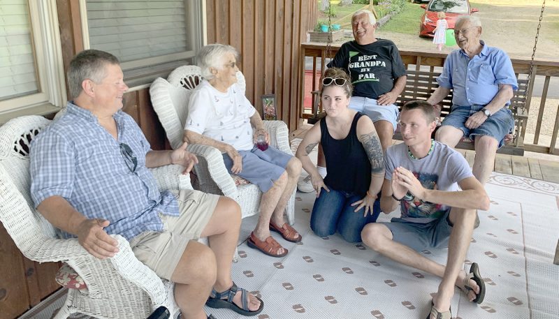 Photo of a family gathering in a patio
