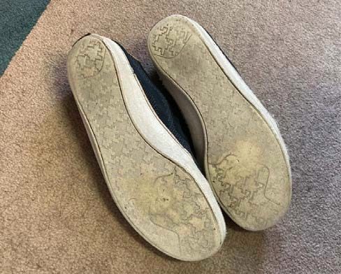 Figure 3.  A pair of shoes flipped upside down to show its minimal tread.
