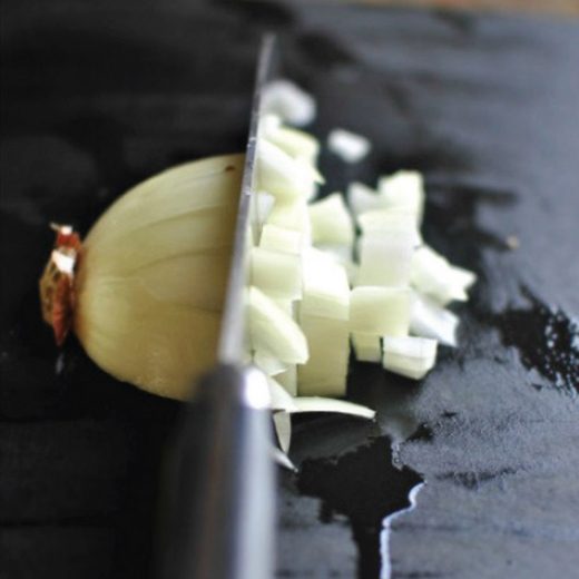 Photo of dicing an onion in half