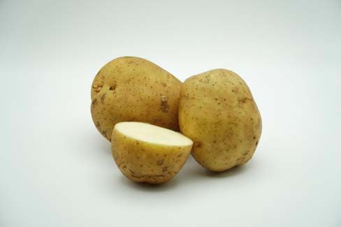 Close up of a cut up potato.