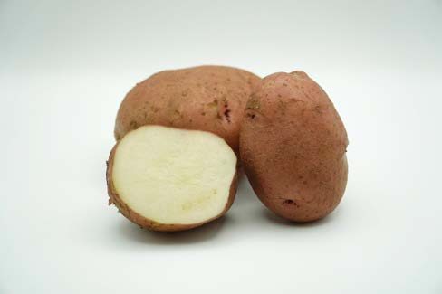 Close up of a cut up potato.