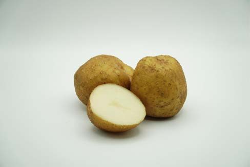 Close up of a cut up potato.