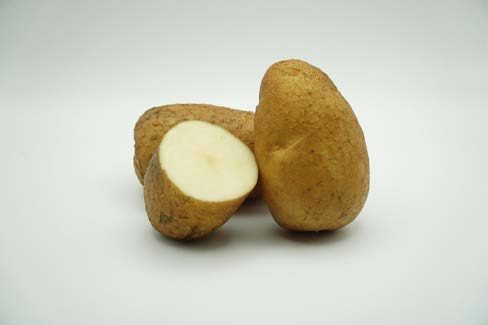 Close up of a cut up potato.