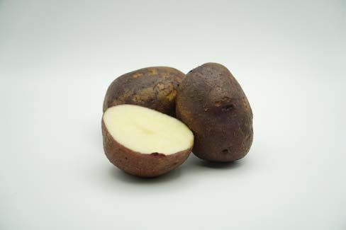 Close up of a cut up potato.