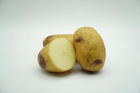 Close up of a cut up potato.