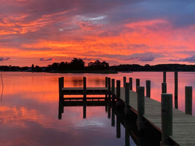 Sunrise over a pier in Westmoreland County.